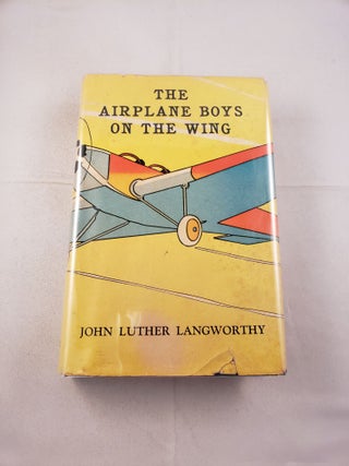 Item #20713 The Airplane Boys on the Wing or Airplane Chums in the Tropics. Langworthy John Luther