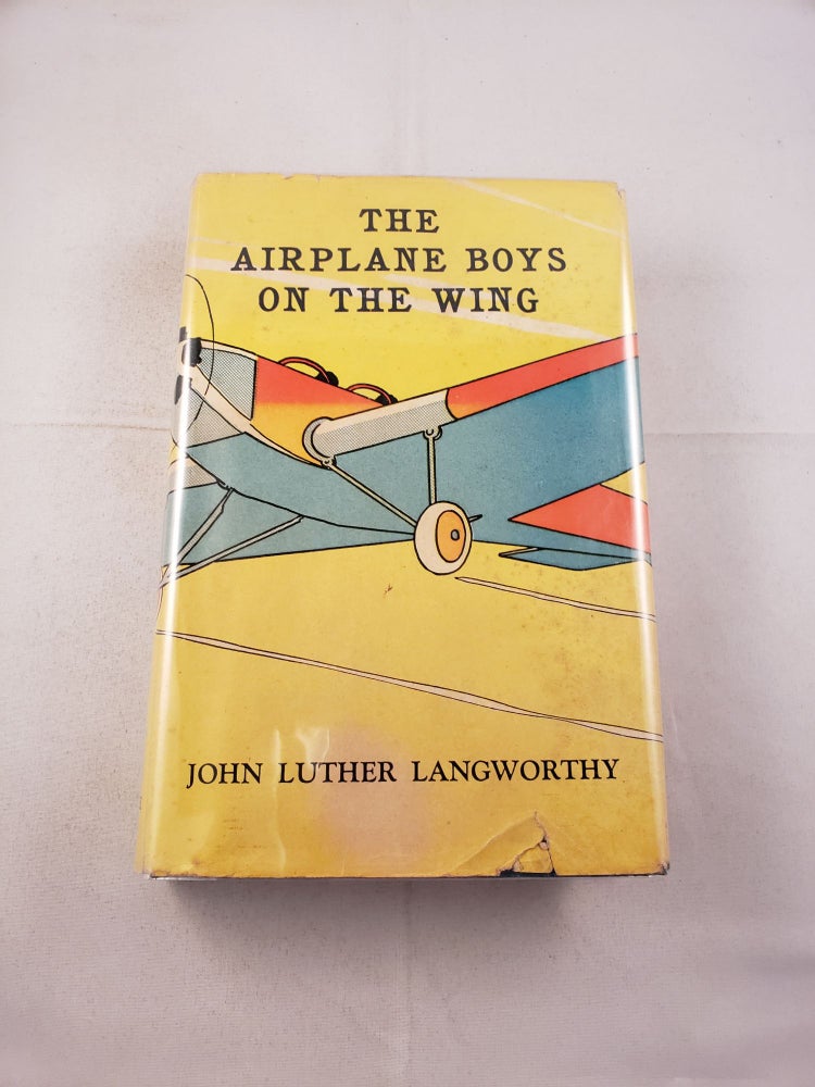 Item #20713 The Airplane Boys on the Wing or Airplane Chums in the Tropics. Langworthy John Luther.