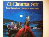 Item #25909 A Christmas Star. Linda Oatman and High, Ronald Himler