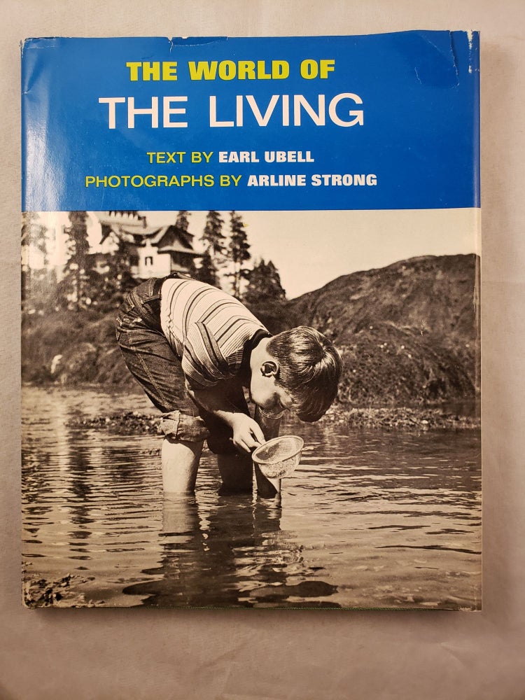 Item #43338 The World of the Living. Earl Ubell, phototgraphic, Arline Strong.